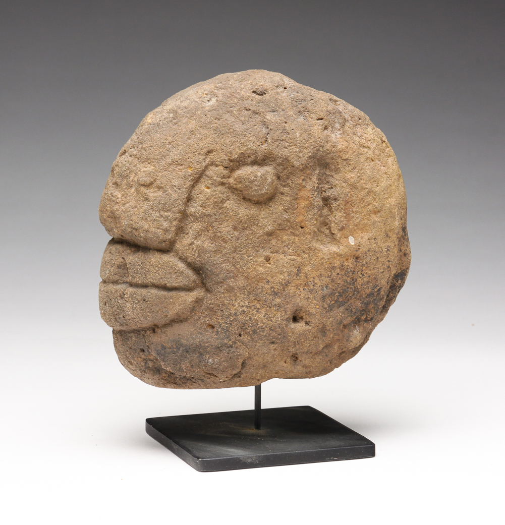 FOLK ART CARVED STONE FACE.