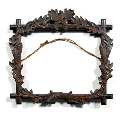 Folk art carved wood frame,