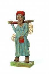 FOLK ART CARVING OF A WOMAN BY