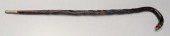 Folk art eagle-carved cane, or