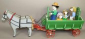 FOLK ART FAMILY IN WAGON BY LU
