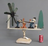Folk art painted men sawing wo