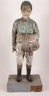 FOLK ART POLYCHROME CARVED WOO