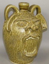 FOLK ART POTTERY FACE JUG BY S
