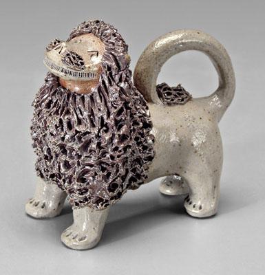 Folk art pottery lion, marked on
