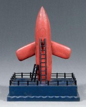Folk art rocket, carved and pa