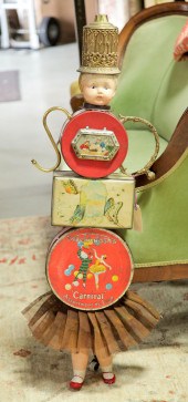 FOLK ART TIN ASSEMBLAGE DOLL.