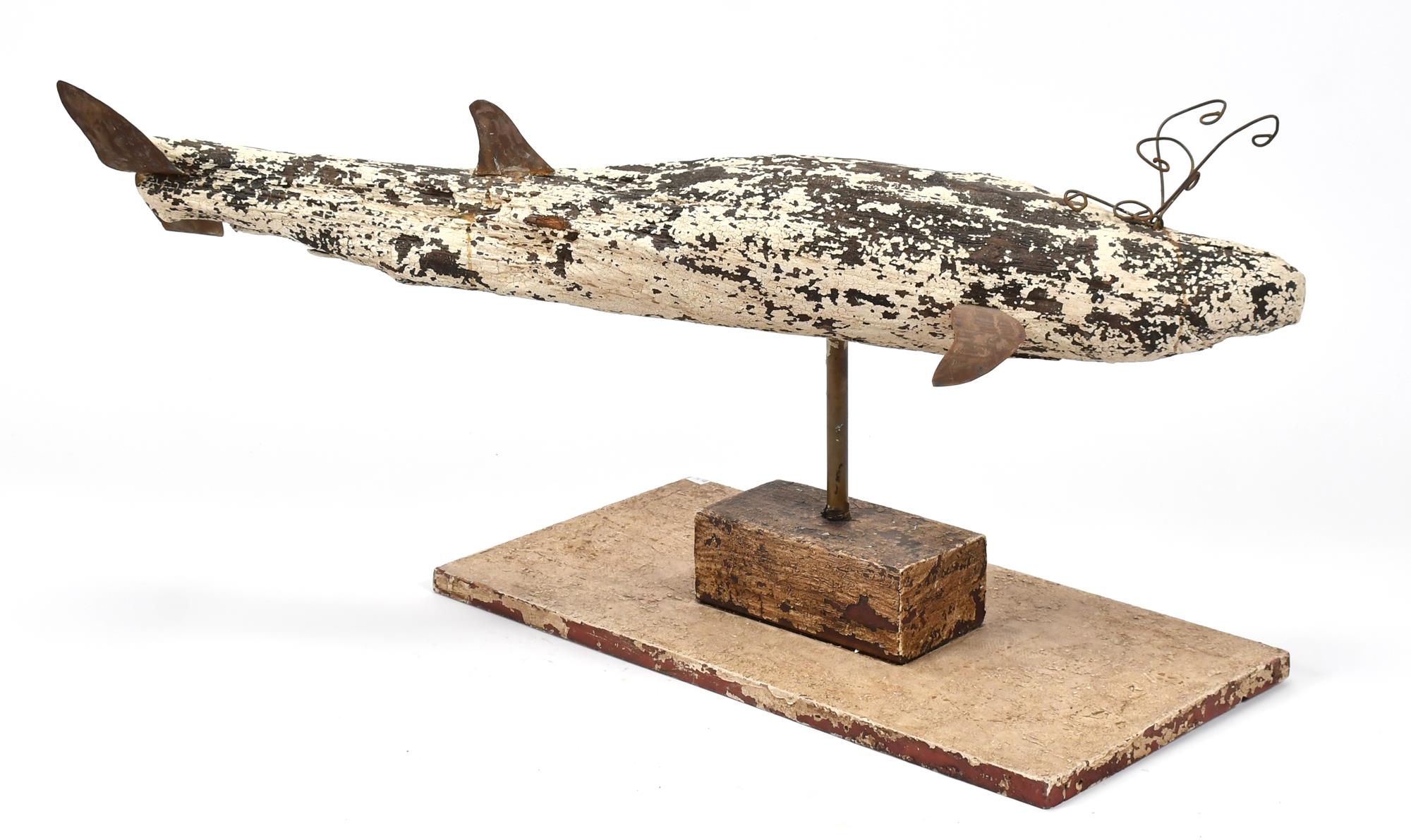 FOLK ART WOODEN WHALE SCULPTURE.