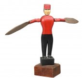 Folk carved and painted whirli