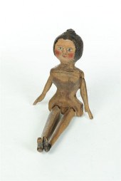 FOLKSY WOODEN DOLL.  American