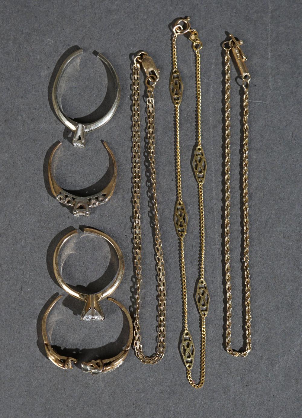 FOUR 14-KARAT GOLD RINGS
