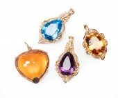FOUR 14 KT. YELLOW GOLD PENDAN