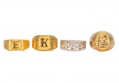 FOUR 18 KARAT GOLD RINGSThree