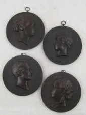 Four 19th c. circular pendant