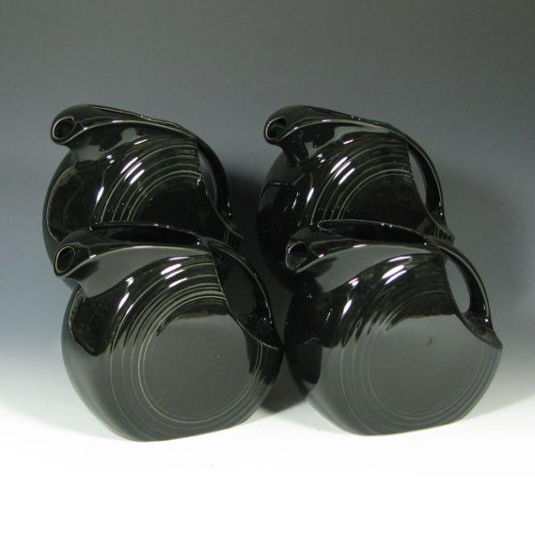 Four (4) Fiesta large disk pitchers