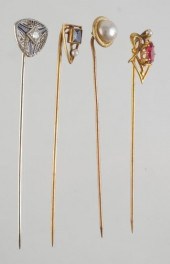 FOUR (4) GOLD AND GEMSTONE STI