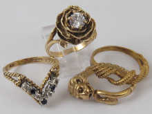 Four 9 ct gold rings.