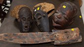 FOUR AFRICAN CARVED WOOD MASKS