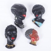 FOUR AFRICAN FEMALE CERAMIC AN