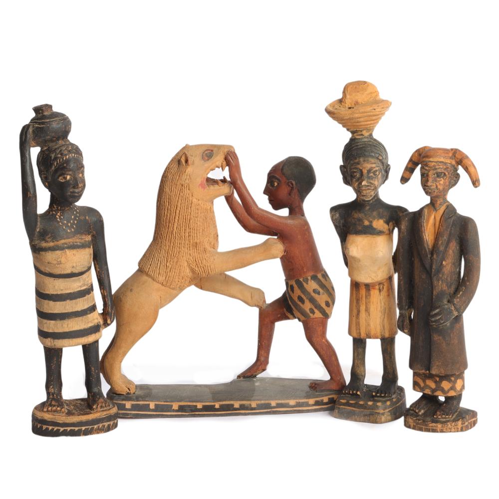 FOUR AFRICAN HAND-CARVED AND