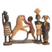 FOUR AFRICAN HAND-CARVED AND P