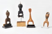 FOUR AFRICAN TRIBAL CARVED WOO
