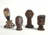 FOUR AFRICAN TRIBAL CARVED WOO