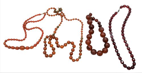 FOUR AMBER BEAD NECKLACESFour Amber