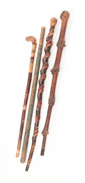 FOUR AMERICAN FOLK ART CANES.