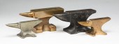 FOUR AMERICAN MINIATURE ANVILS