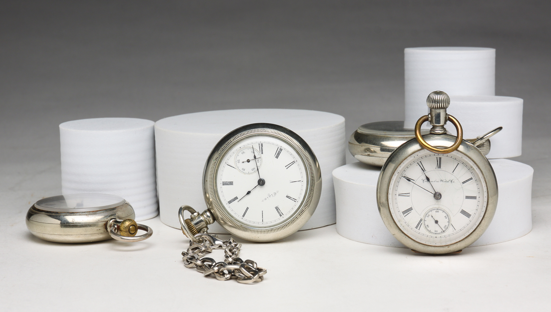 FOUR AMERICAN POCKET WATCHES. Circa