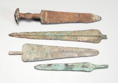 Four ancient bronze projectile