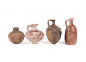 FOUR ANCIENT TERRACOTTA VESSEL