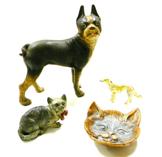 Four animal figures including: a