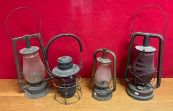 Four antique barn lanterns,