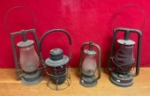 Four antique barn lanterns, in
