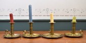 Four antique brass chamberstic