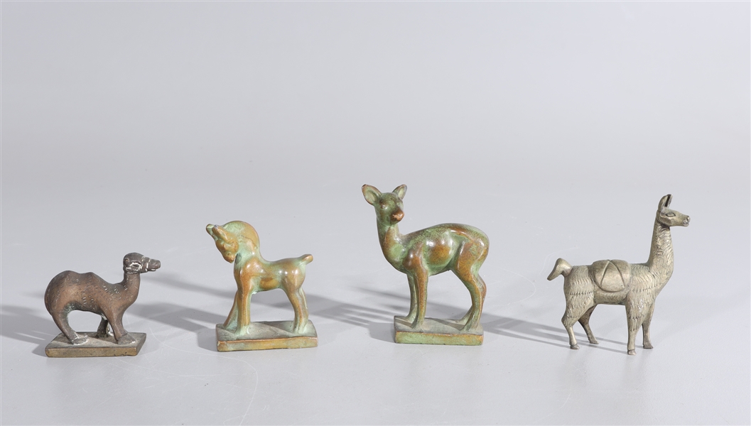 Four antique bronze animals