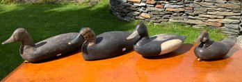 Four antique carved and painted