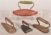 FOUR ANTIQUE CAST IRON FLAT IR