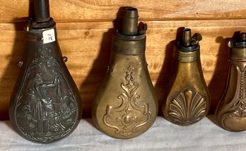 Four antique copper and brass gun