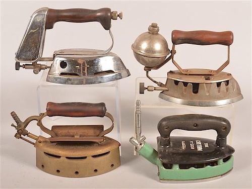FOUR ANTIQUE GAS FLAT IRONS.Four