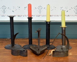 Four antique hog scraper