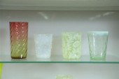 FOUR ART GLASS TUMBLERS. Amber