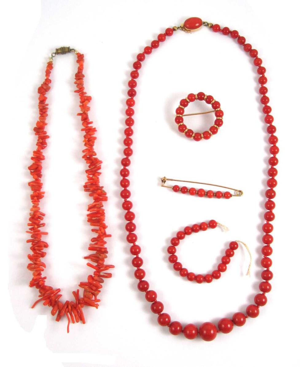 FOUR ARTICLES OF CORAL JEWELRY: 1.)