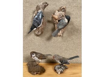 Four artisan carved and painted