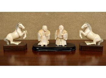 Four Asian carved bone figures,