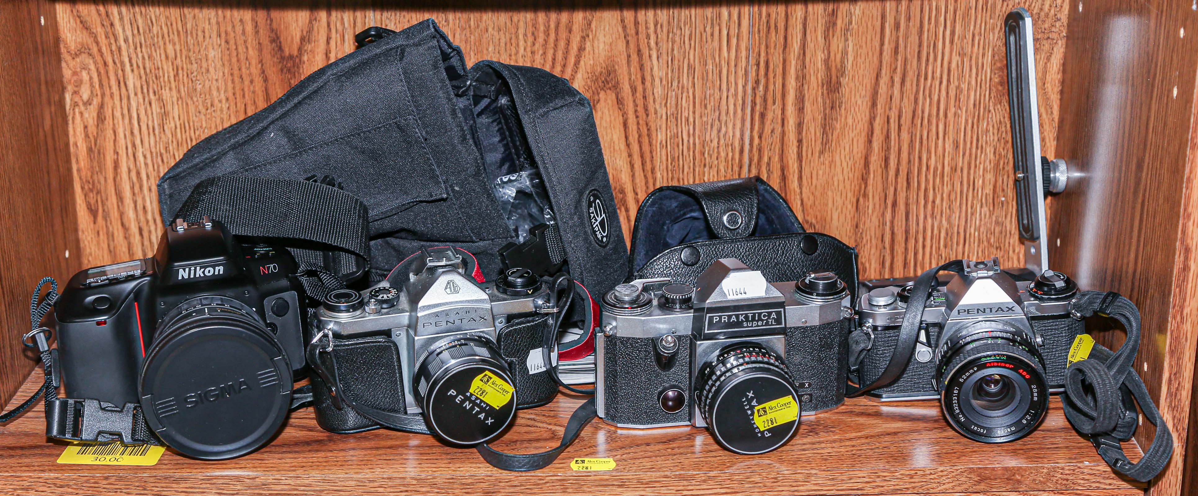 FOUR ASSORTED CAMERAS Including