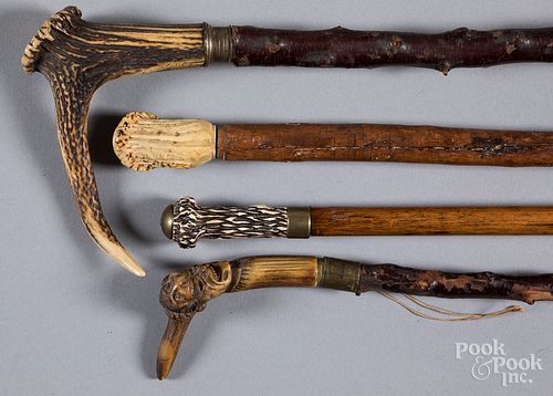 FOUR ASSORTED CANES/WALKING