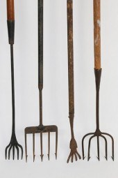 FOUR ASSORTED EEL SPEARSFour A